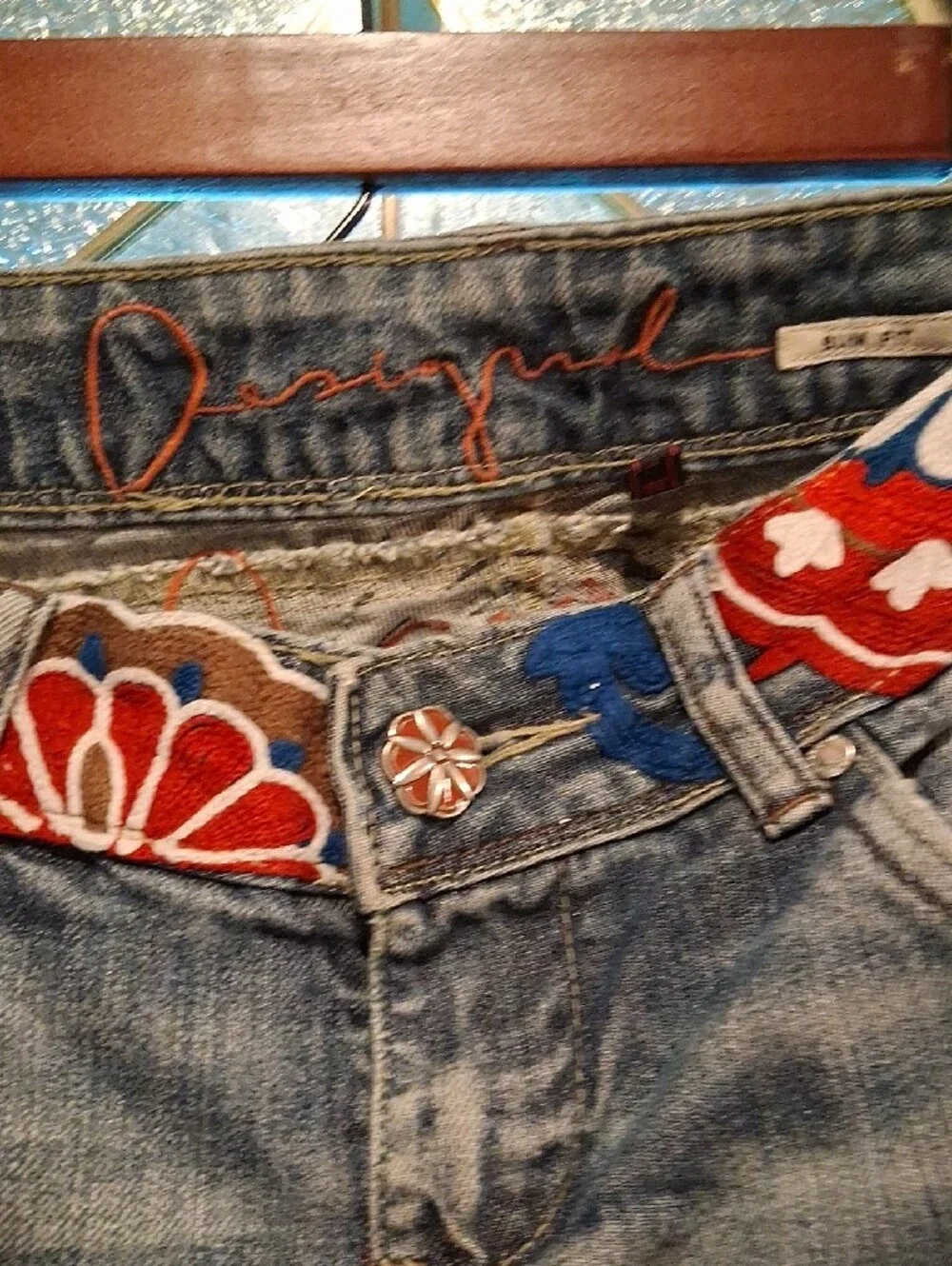 Blue Distressed Women's Jeans with Decorative Waistband
